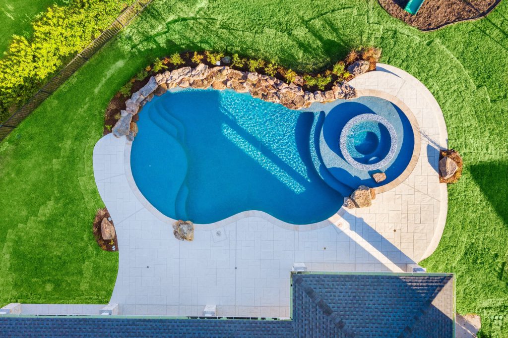 Majesty: Gorgeous residential outdoor pool design in Richmond Texas.