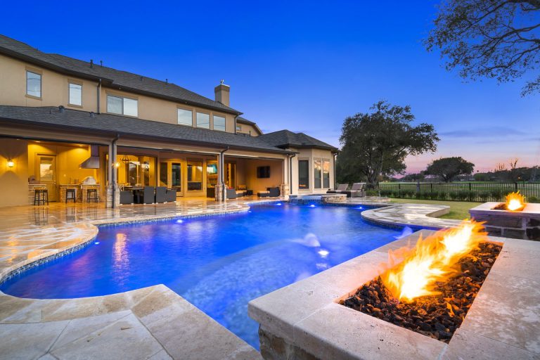 Pool with integrated fire and water features
